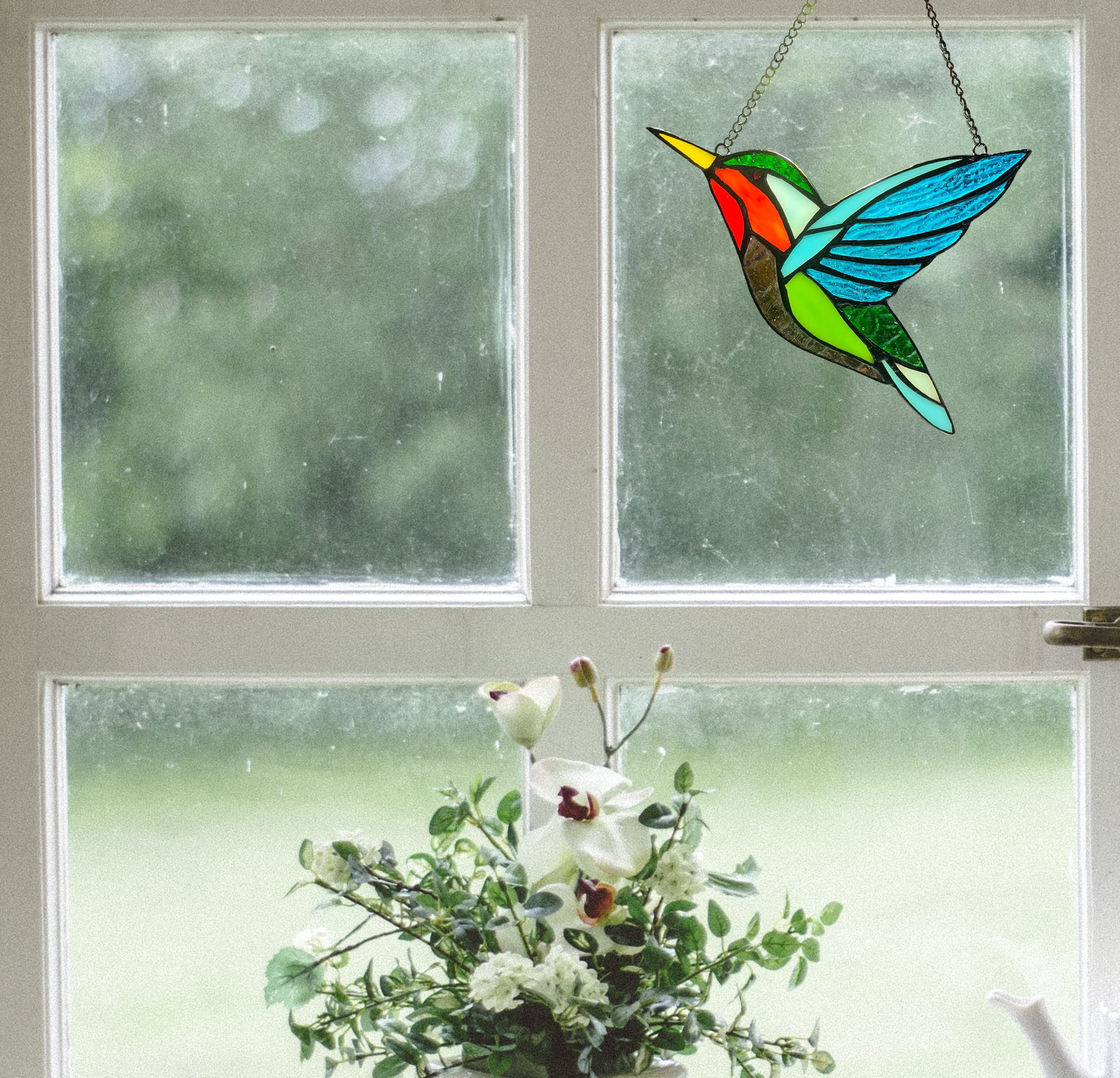 ZUAJITER hummingbird glowing in sunlight to create colorful room reflections