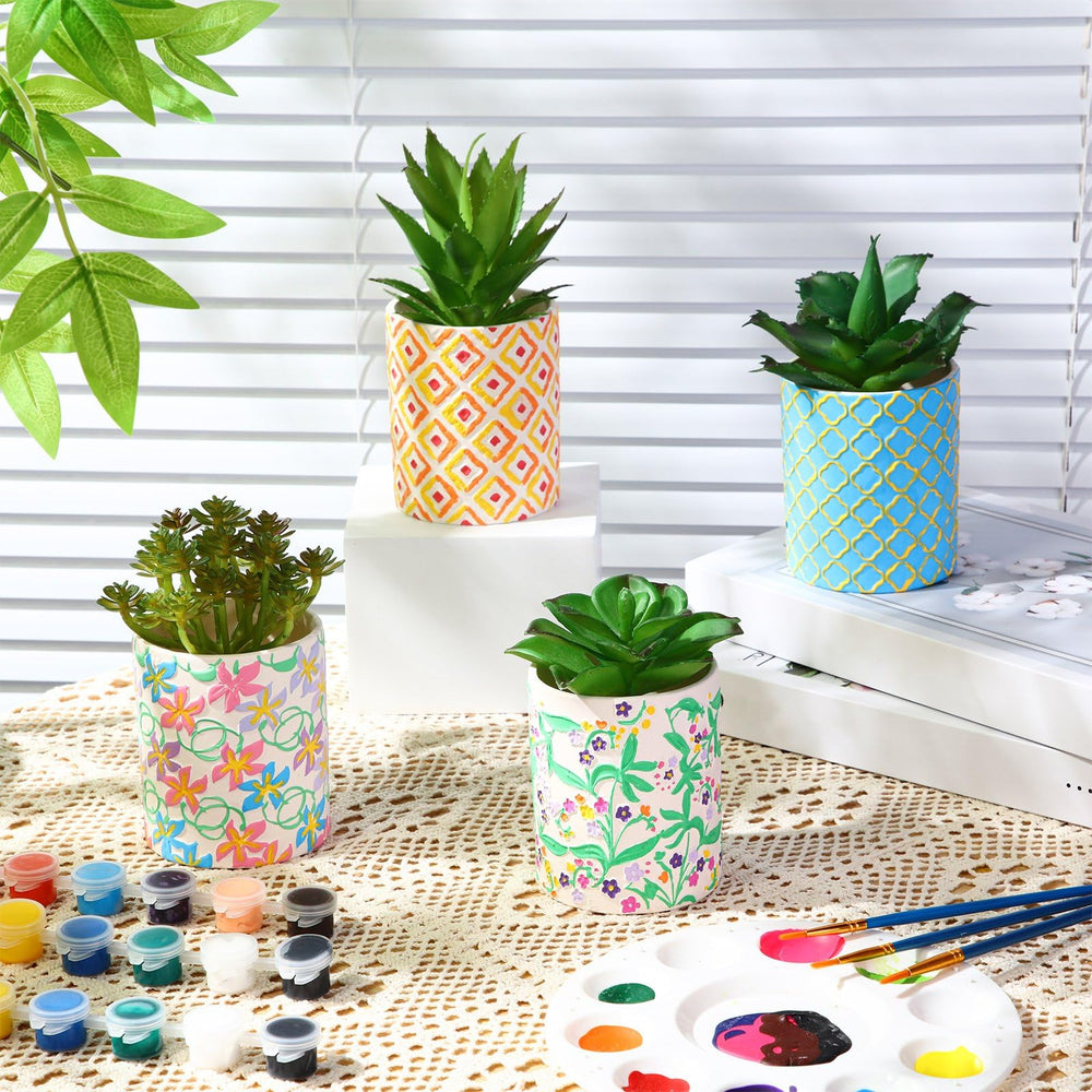 Zubebe pot next to coin for scale, demonstrating compact size suitable for small succulents and desks