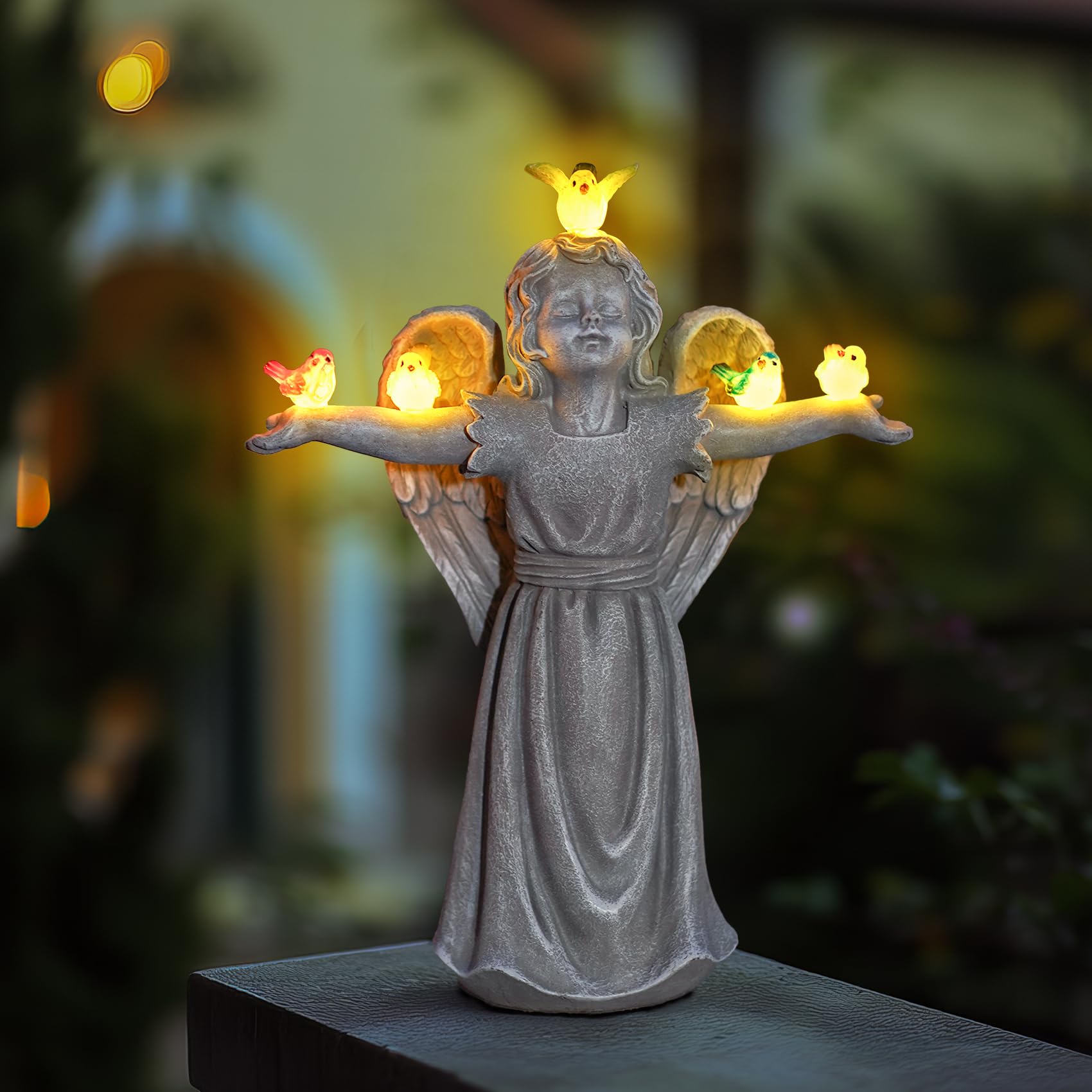 zuzuzen solar panel on angel statue top, captures sunlight for automatic lighting