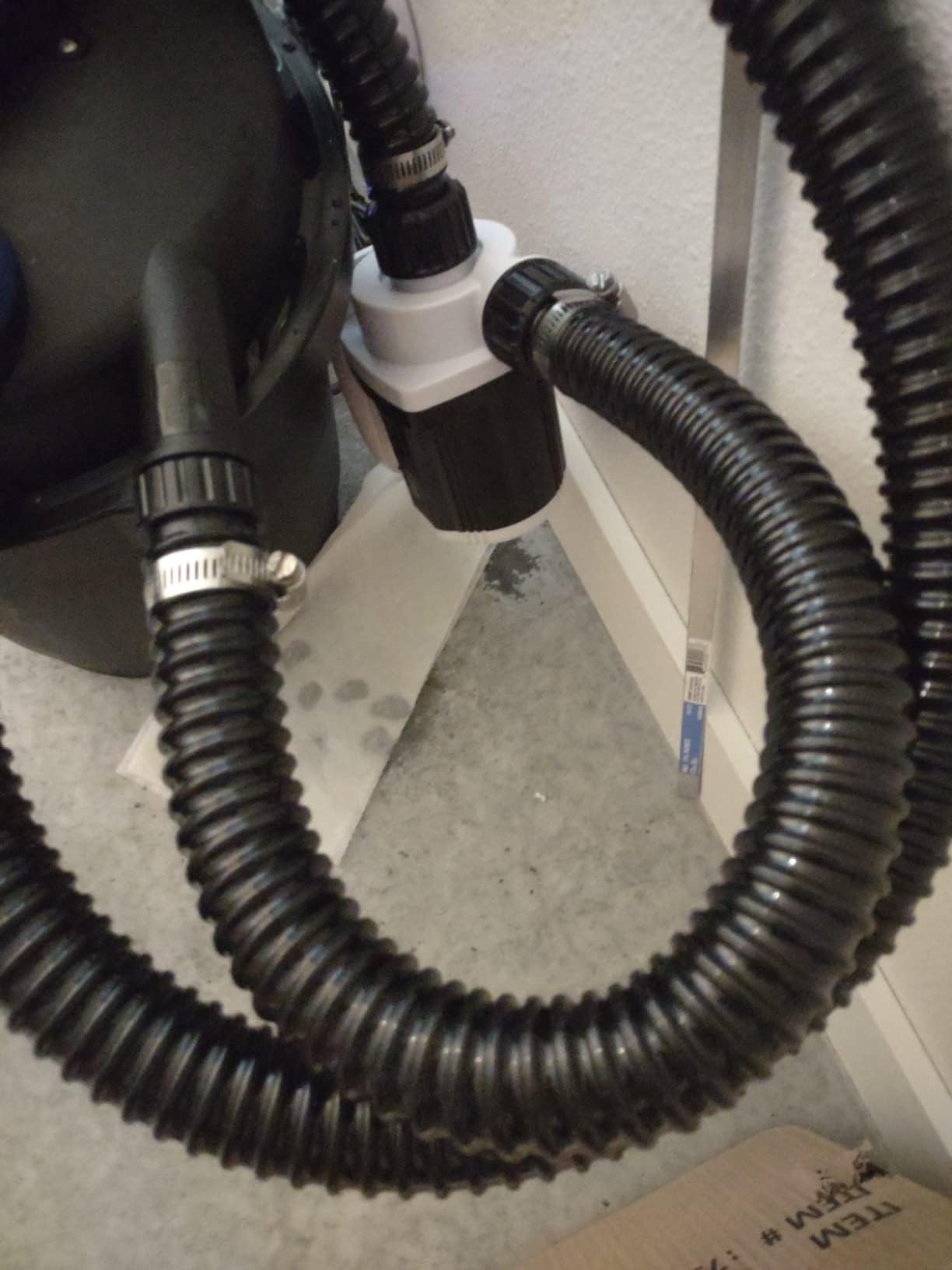 ZY-hosetube beside ruler showing 10ft length and 1-1/2" inner diameter for scale