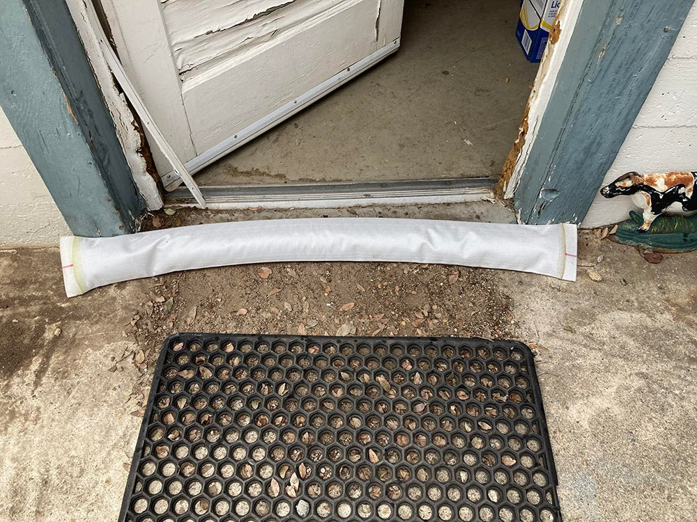 ZY-hosetube next to measuring tape showing 100ft length and scale